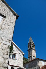 Fototapeta premium St Nicholas church in Perast clock tower