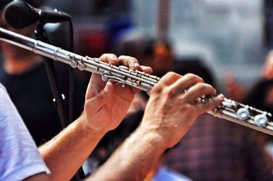 Man Playing Flute