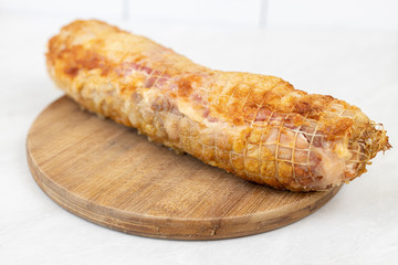 Fried rolled chicken meat with cheese and ham