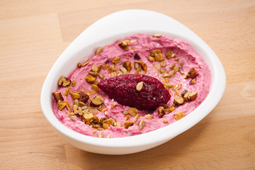 Organic plant based hummus with granola. Perfect for vegan gluten free. Freshly homemade for takeaway and delivery. Healthy food photography.