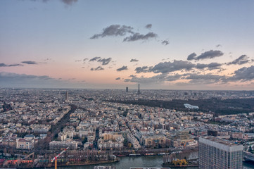 Aerial drone shot of Levallois Neuilly Paris with Eiffel Tower , tour montparnasse, jardin d'acclimation
