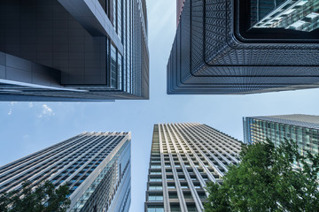 Modern office buildings in the Marunouchi district, Tokyo, Japan - obrazy, fototapety, plakaty