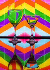 Wine glass with stunning background color patterns and reflections