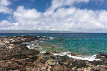 Sailboat off the Kapalua Coastal Trail in Hawaii