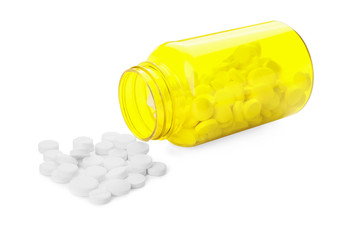 Bottle of pills on white background