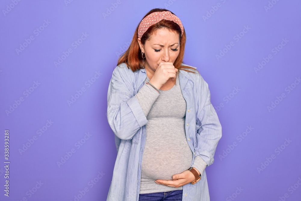 Sticker young beautiful redhead pregnant woman expecting baby over isolated purple background feeling unwell