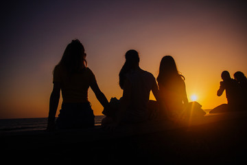 Fototapeta na wymiar woman backlight sunset beach.