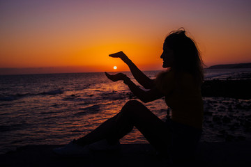 woman backlight sunset beach.