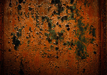 Iron texture or background with rusty peeling orange paint. High contrast and resolution image with place for text. Template for design