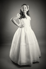 Gorgeous young girl dressed in white