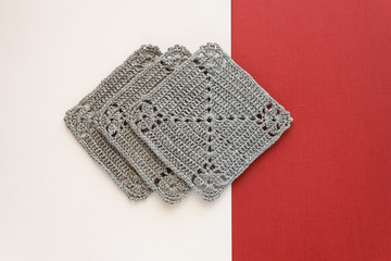 Crocheted napkins square shaped. Napkins under hot