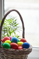 Easter Day, basket with colorful Easter Eggs