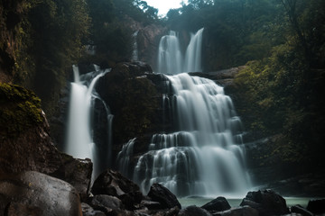 Mystic dark waterfall in central america 