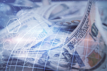 Double exposure of world map drawing over us dollars bill background. International concept.