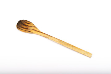 wooden kitchen spoon on white background