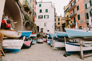 Fototapeta na wymiar wooden boats parking harbour in Cinque Terre