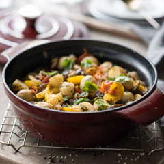 Homemade Vegetable Stew with Potatoes, Pepper, Tomatoes and Eggplant in Cast Iron Casserole