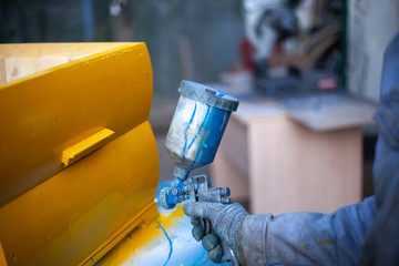 Painting beehives.