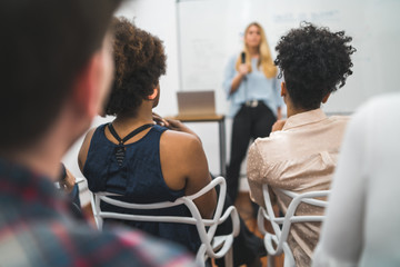 business woman explaining plan of work in conference.