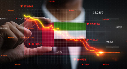 Graph Falling Down in Front Of United Arab Emirates Flag. Crisis Concept © natanaelginting