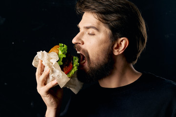 young man eating a salad