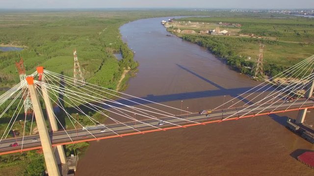 Aerial video of bridge. Slow passing through. Top side view. Zarate. Buenos Aires. Argentina.