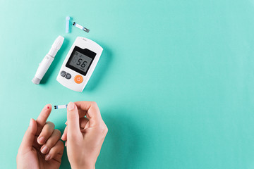 Healthcare and medical concept, The diabetic measures the level of glucose in the blood. World...