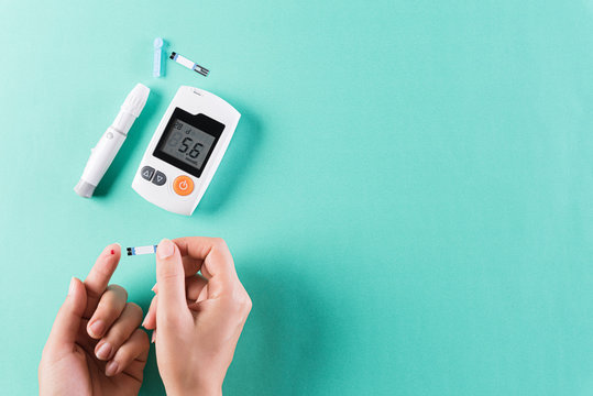 Healthcare and medical concept, The diabetic measures the level of glucose in the blood. World Diabetes day, 14 November.