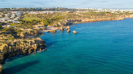 Aerial view of Arrifes beach and Vigia beach, in Albufeira. Beautiful beach between the cliffs of the Algarve in Portugal