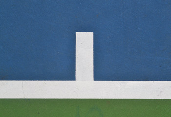 Fototapeta premium Tennis court at base line mark, close up, aerial view.