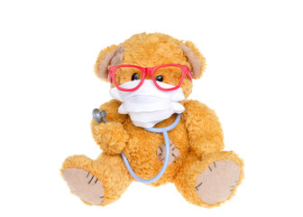 Little fluffy brown bear wearing a white face mask, pink glasses, holding a bear sized stethoscope looking at viewer, Isolated on white.