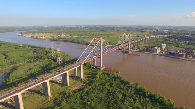 Bridge from above. Hiperlapse. Flying around shot. Arial view. Zarate. Buenos Aires. Argentina.