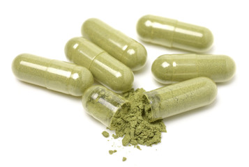  Andrographis Paniculata capsules (Herbal capsules) isolated on a white background,Close up.