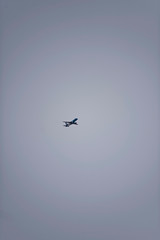 Canceling flights during quarantine. The plane is in the sky. The tourist plane is transporting people on vacation.