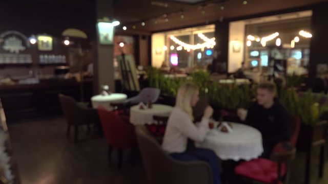 Blurred background of Restaurant and Coffee shop with vintage filter. Which including of people in cafe.