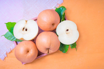 Snow pear or Feng Shui pear on colors background, Korean pear on Pastel colors background, 
