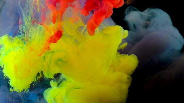 4K , Color paint drops in water , abstract color mix , drop of Ink color mix paint falling on water ,Colorful ink in water, 4K footage,
