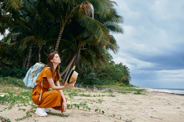 young woman on the beach in summer