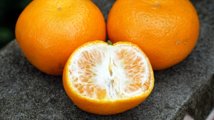 Citrus fruit on the table in the morning, outdoors