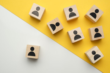 The concept of training staff, employees - wooden blocks with abstract people.
