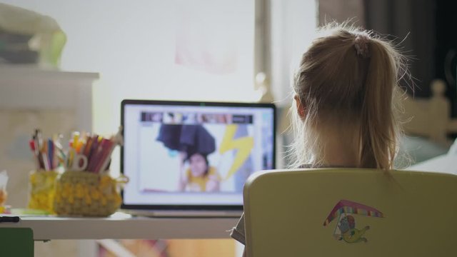 Little Girl Have Distance Learning At Home