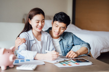 Asian couple at home Financial management