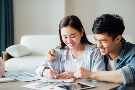 Asian couple at home Financial management