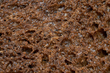 Slice of a bread, texture, macro, closeup.