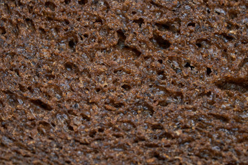 Slice of a bread, texture, macro, closeup.