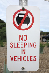 No sleeping in vehicles sign.This sign can be seen on the roads of the state of Victoria, Australia.