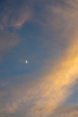 Moon and Clouds at Sunset
