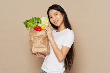 young woman holding shopping bags