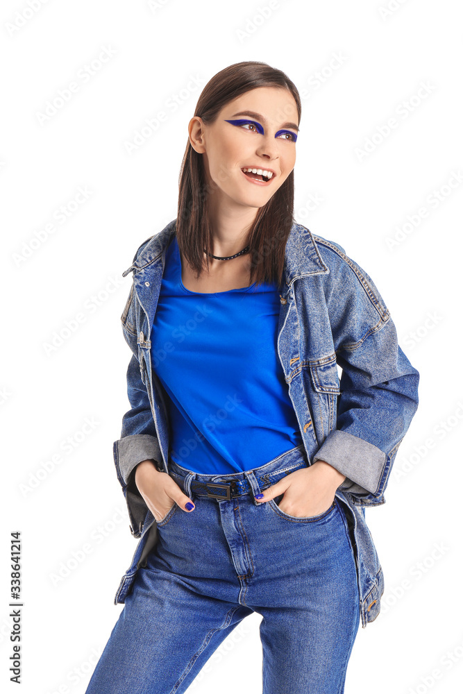 Wall mural Portrait of fashionable young woman on white background