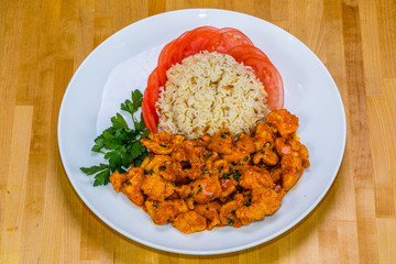 Garlic Chicken Turkish style with Rice and Tomatoes 